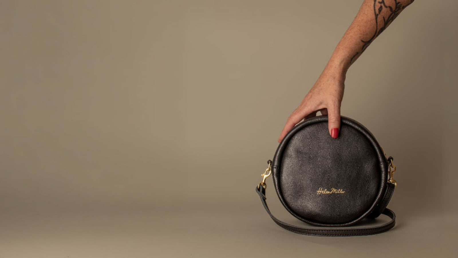 Black leather NZ made round bag
